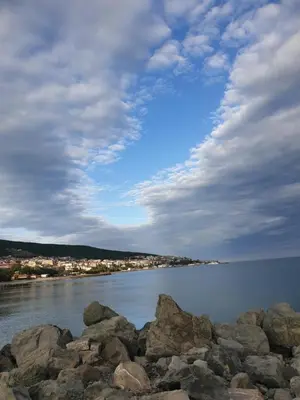 a large group of rocks on a body of water at MitProt luks studio Panorama Bay 2 ap.105 in Sveti Vlas