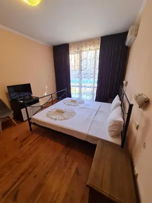 a bedroom with a large bed in a room at MitProt Panorama Bay 2 ap 30 in Sveti Vlas