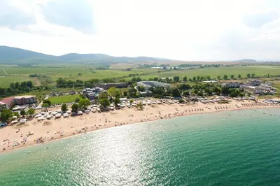 an aerial view of a beach with a crowd of people at Апартамент на къмпинг Градина in Chernomorets