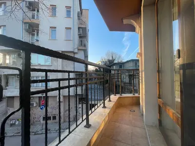 a balcony with a view of a building at 3 стаен апартамент идеален център Варна in Varna City