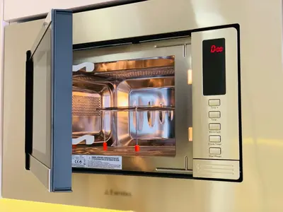 a microwave oven with its door open on a wall at Beige-a-view, Sea Dreams in Sveti Vlas