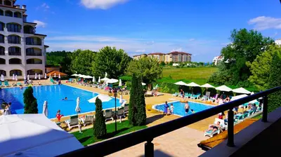 a view of a swimming pool in a resort at Апартамент Сънрайз Обзор - Apartment Sunrise Obzor in Obzor