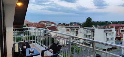 a balcony with a view of a city at Apartment 7 in Tsarevo