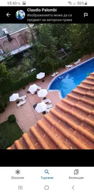 a picture of a swimming pool with chairs and umbrellas at Golden Dreams in Sunny Beach