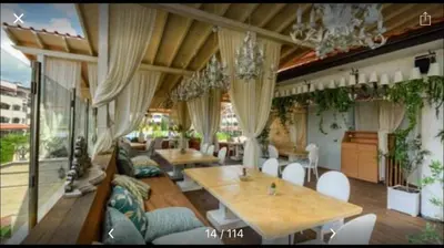 a living room with a table and chairs at Casa Real B 5-1 in Sveti Vlas