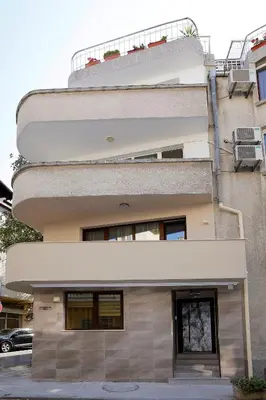 a building with a balcony on top of it at Deluxe 2 Studios City Center in Burgas City