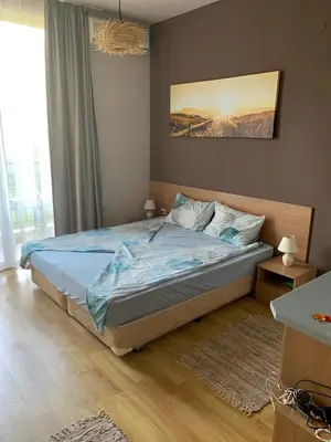 a bedroom with a large bed in a room at AFRODITA I 112 Private Cozy Studio Sunny Beach in Sunny Beach