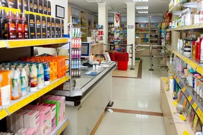 a store aisle of a grocery store with a pharmacy at Sunrise - Apartment 41,Santa Marina, Sozopol in Sozopol