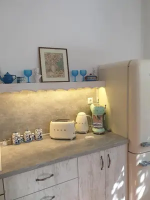 a kitchen counter with two toasters on top of it at Апартамент BOHO CHIC 2 Free parking in Varna City