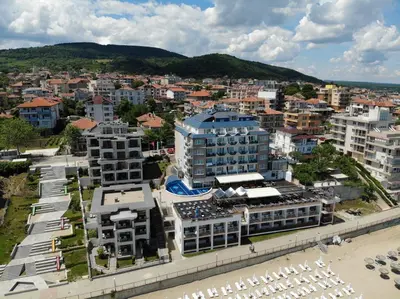 an aerial view of a city with buildings and a beach at Paraiso Beach - All Inclusive in Obzor