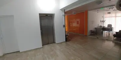 an empty room with a door and a table at апартамент на брега на морето Бургас - Сарафово in Burgas City
