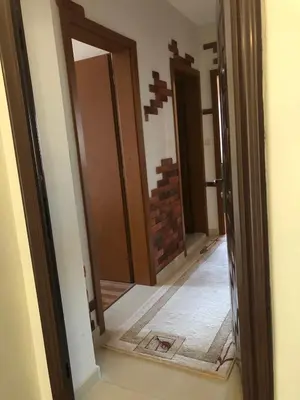 a hallway with two doors and a tile floor at Dunav Apt.4 in Ravda