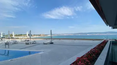 a swimming pool with a view of the ocean at PARADISO 'В' 107 Private Cozy Studio NESSEBAR in Nesebar