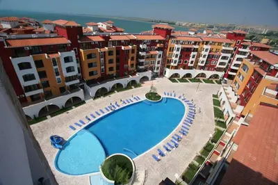 arial view of a swimming pool in a city at Аpartments Comfort -Marina Cape in Aheloy