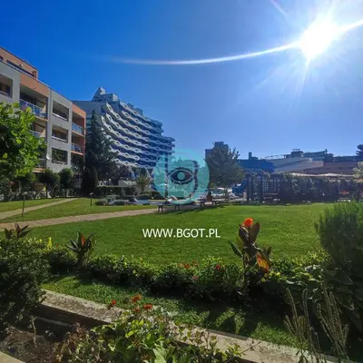 a park with a sign that saysoitbush bin at TRAKIA PLAZA Apartments in Sunny Beach