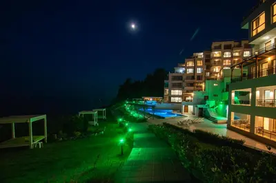 a view of a building at night at White Cliffs, Byala in Byala