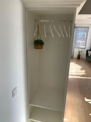 a room with a glass cabinet with a potted plant at CASA VISTA in Burgas City