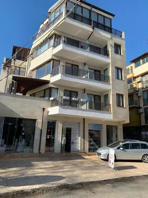a building with a car parked in front of it at CASA VISTA in Burgas City