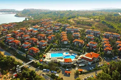 an aerial view of a resort near the water at Lilia Sun Apartment in Sozopol