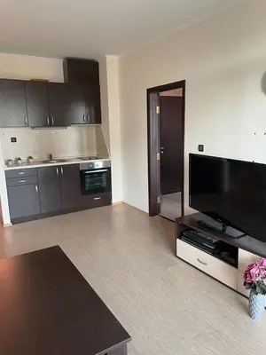 a large living room with a flat screen tv at Babylon SP apartment 56 in Sunny Beach