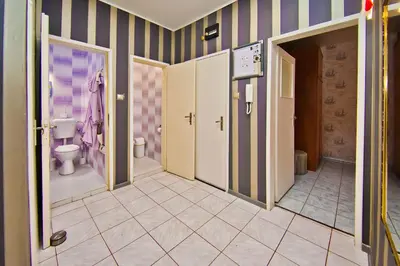 a room with a bathroom with a toilet at Perla 2-bdrm in the heart of the city in Varna City