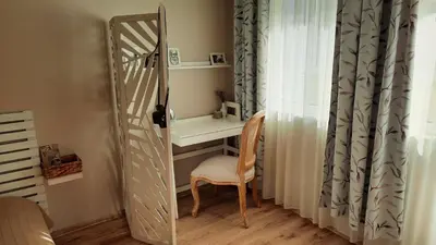 a mirror in a room with a desk and a chair at Soulful Apartments - AlmaLetta in Varna City