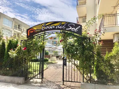 a gate with a sign that reads garden used sql at Menada Casa del Sol Apartments in Sunny Beach