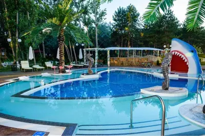 a swimming pool in a resort with a shark theme at Sweet Homes 6 in Sunny Beach