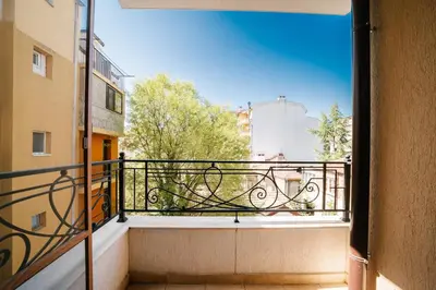 a balcony with a view of a city at Апартамент за гости Веси in Burgas City