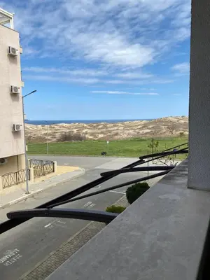 a view of a street from the roof of a building at Apartman Kuba in Primorsko