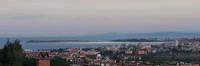 a view of a city and a body of water at Вила Синя Иглика in Kosharitsa