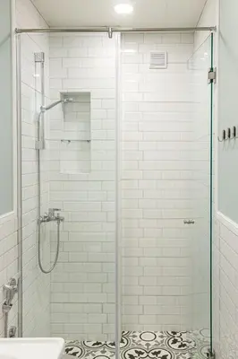a bathroom with a shower with a glass door at COZZIE by RV Apartments in Varna City