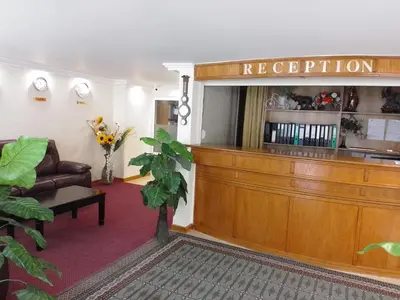 a court room with aption sign on the wall at Санта Марина in Varna City