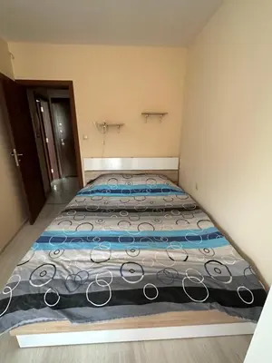 two beds in a small room at Apartment Starfish in Varna City