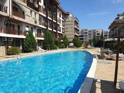 a large swimming pool in front of a building at MitProt Panorama Bay 2 Luks Studio 159 in Sveti Vlas