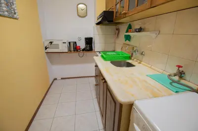 a kitchen with a sink and a counter top at One-bedroom Flat Close to the Sea Garden by Flat Mаnаger in Burgas City