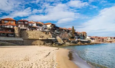 a group of houses on a hill next to the beach at Sozopoli Hills, app B7 in Sozopol