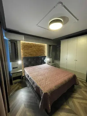 a bedroom with a bed in a room at Sea Scenery Apartment in Burgas City