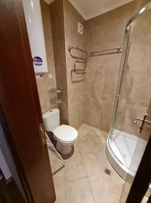 a bathroom with a toilet and a shower at MitProt Panorama Bay 2 ap 31 in Sveti Vlas