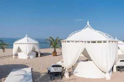 a wedding marquee on a beach with the ocean at Oasis Resort & Spa Cozy Studio in Lozenets