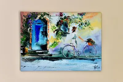 a painting of a bike in front of a house at Апартамент Limoncini in Sozopol
