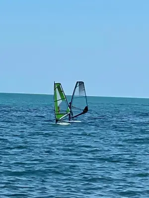 two sailboats in the water on the ocean at Studio in Sveti Vlas