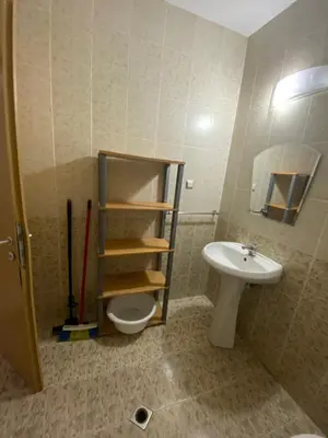 a bathroom with a toilet and a sink at Stella Polaris 1 Apartments in Sunny Beach