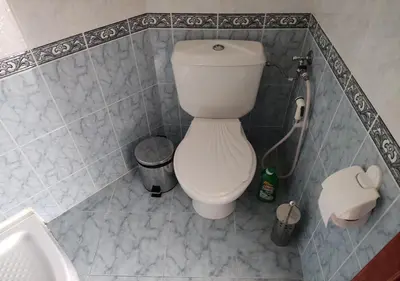 a small bathroom with a toilet and a sink at Ideal three bed apartment for families closed to the Beach in Sunny Beach