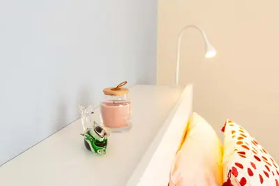 a room with a table with a jar on it at Studio Maré Chernomorets in Chernomorets