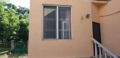 a window on the side of a house at Sea & chill suite in Burgas City