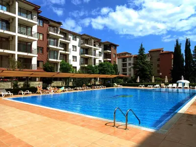 a large swimming pool in front of a building at Apolon 8 Relax Studio with Pools in Sunny Beach