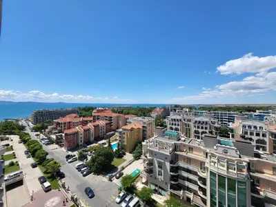 an aerial view of a city with buildings at Апартамент Сънсет Ризорт in Pomorie
