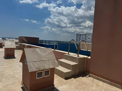 a set of stairs on the roof of a building at Fenix Apart Complex in Sveti Vlas