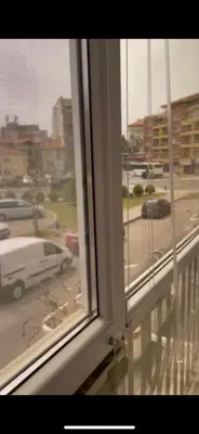 a window with a view of a parking lot at Bryan